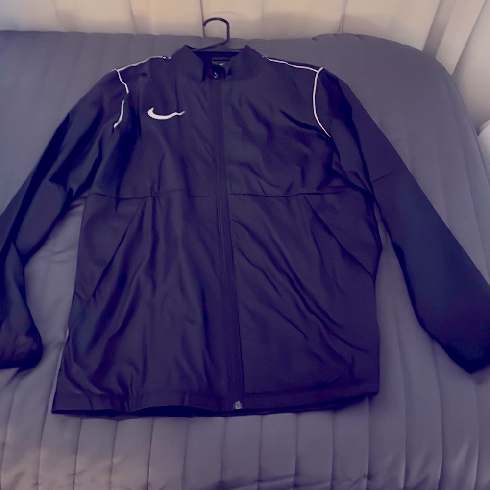 Nike jacket. Light material. Worn once.